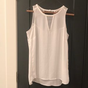 Beautiful sheer white sleeveless blouse